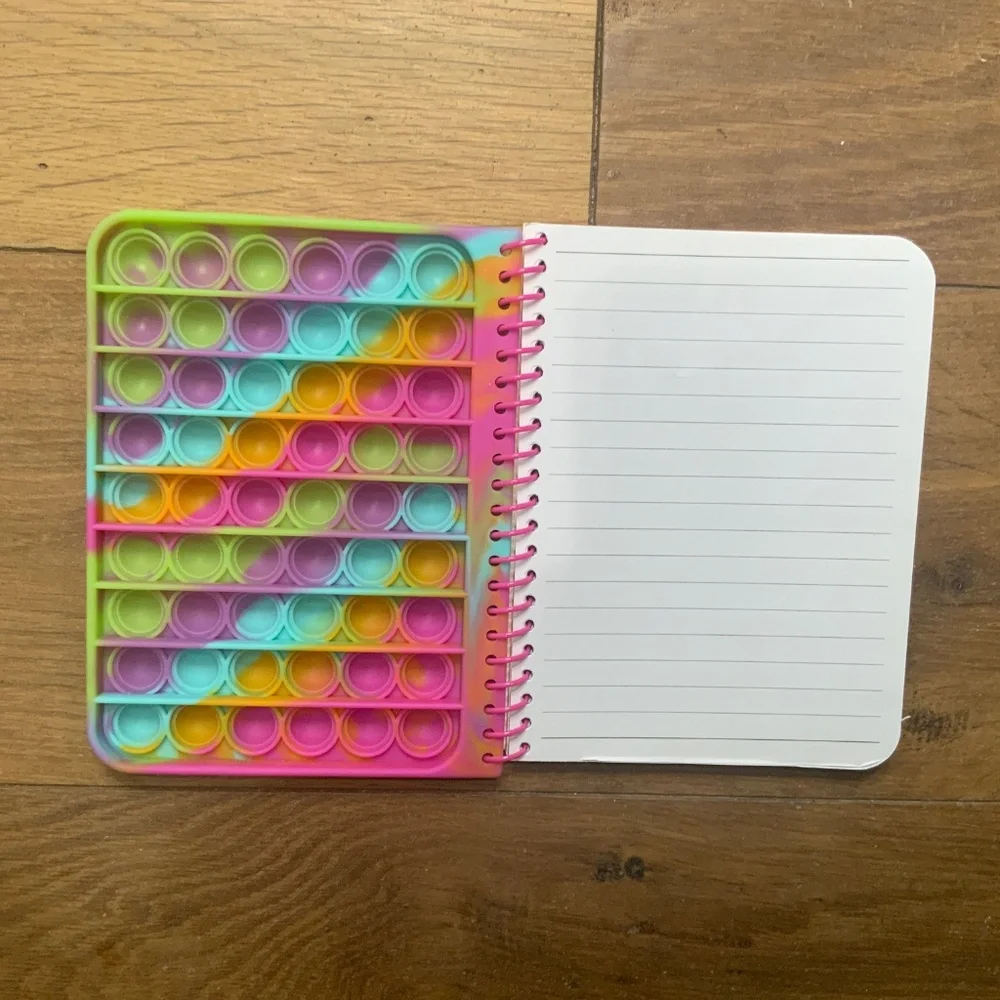 Bundle of 8 Pop-It Fidget Toys Including Notebook